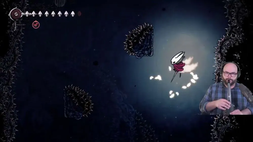 Jugar Hollow Knight: Silksong con un saxofón, el streamer que hizo igual en Elden Ring lo demuestra en una de las zonas más complicadas